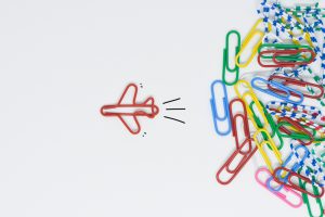 Business,Concept,For,Group,Of,Stacked,Paperclip,With,Another,One